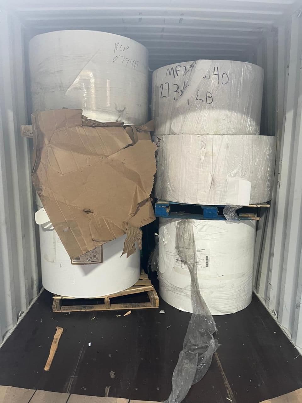 Large paper rolls loaded for export