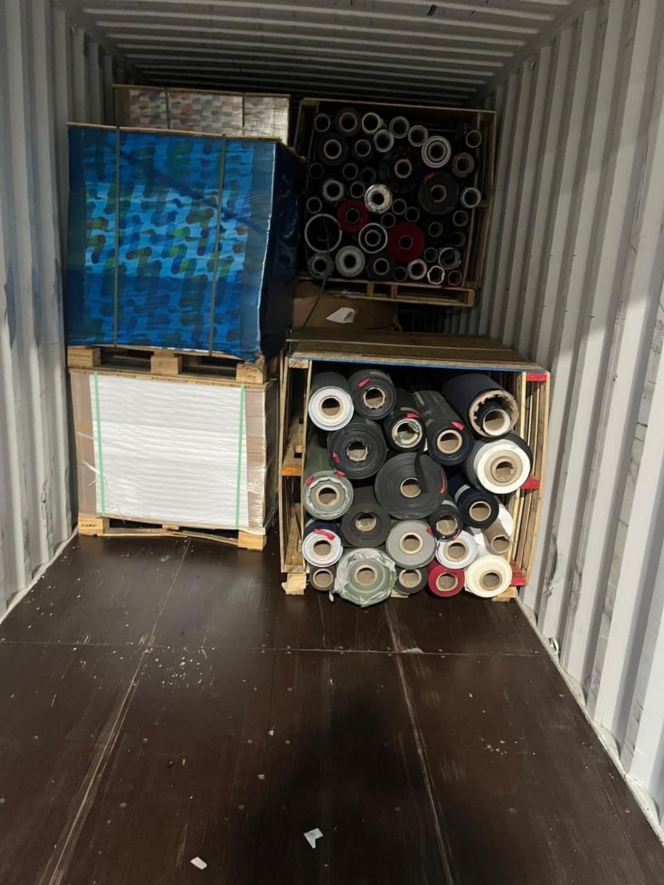 Loaded export container with paper stock
