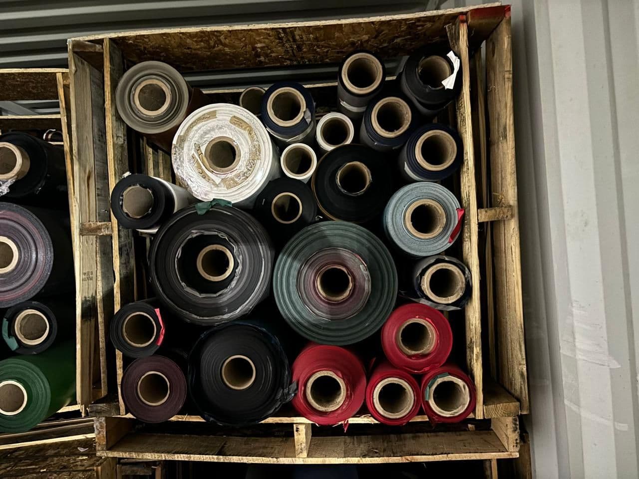 Close-up of stacked paper and material roll ends